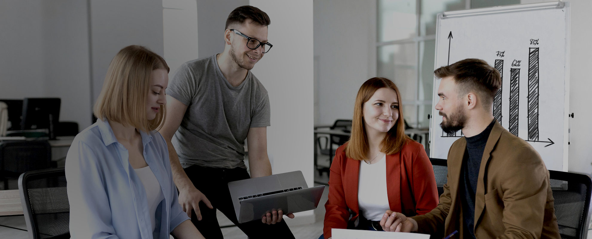 This image captures two members of Weblook’s professional design team mid-conversation, embodying the collaborative spirit and expertise that clients can expect from Weblook’s web design services in Sri Lanka.