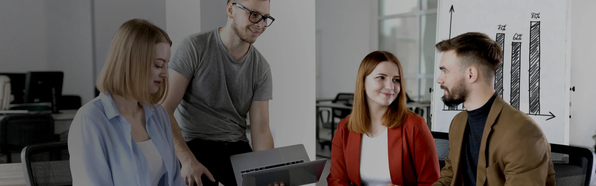 This image captures two members of Weblook’s professional design team mid-conversation, embodying the collaborative spirit and expertise that clients can expect from Weblook’s web design services in Sri Lanka.